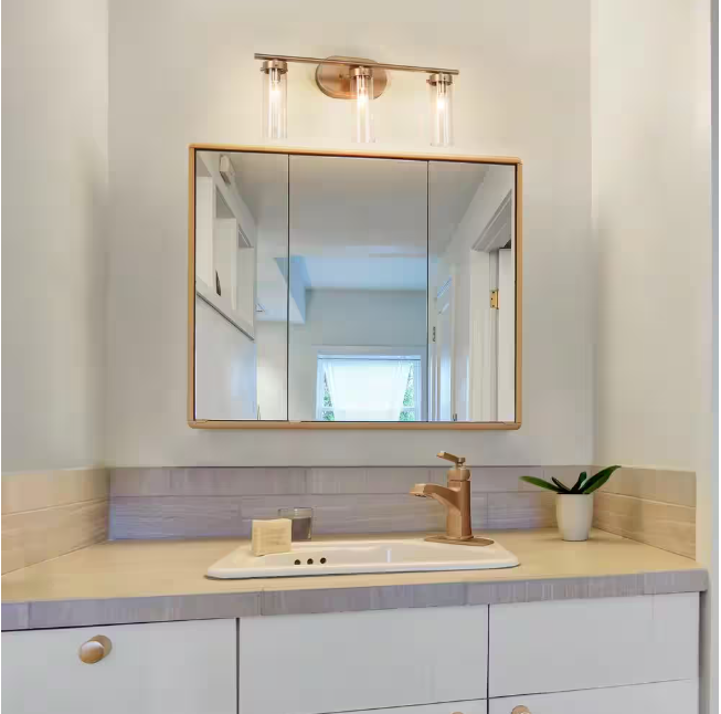 LNC Antique Gold Modern 3-Light Bathroom Vanity Light 21.5 in. Powder Room Wall Light with Cylinder Clear Glass Shades