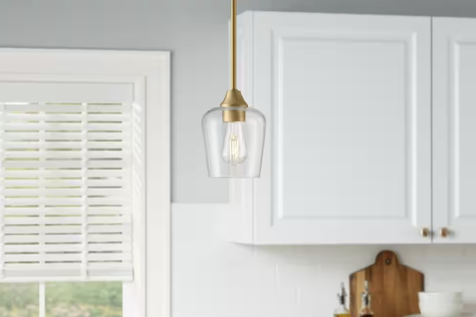 Pavlen 5.5 in. 1-Light Antique Brass Mini Pendant with Clear Glass Shade