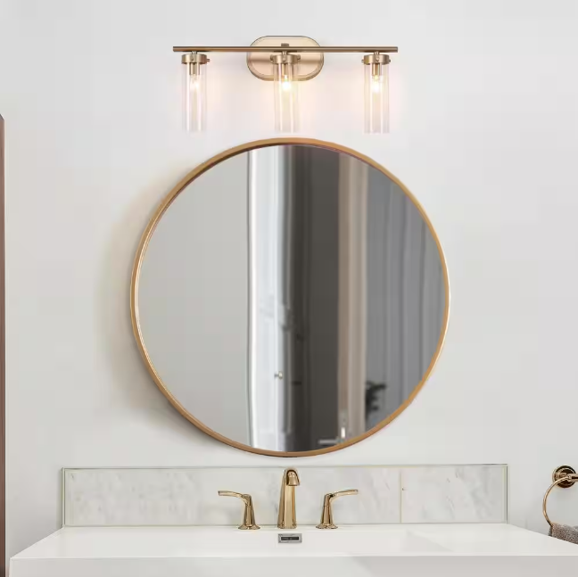 LNC Antique Gold Modern 3-Light Bathroom Vanity Light 21.5 in. Powder Room Wall Light with Cylinder Clear Glass Shades