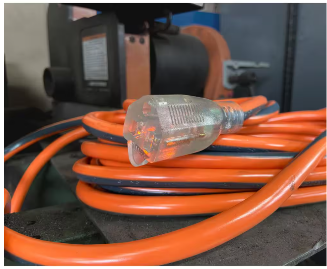 RIDGID 100 ft. 12/3 Heavy Duty Indoor/Outdoor Extension Cord with Lighted End, Orange/Grey