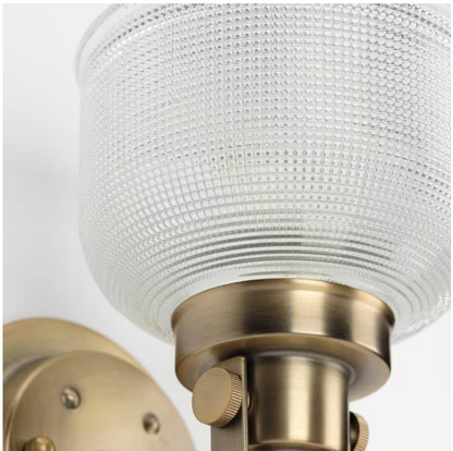 Progress Lighting Archie Collection 1-Light Vintage Brass Clear Double Prismatic Glass Coastal Bath Vanity Light