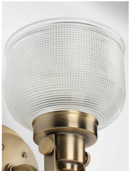 Progress Lighting Archie Collection 1-Light Vintage Brass Clear Double Prismatic Glass Coastal Bath Vanity Light