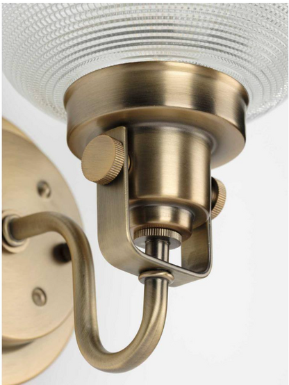 Progress Lighting Archie Collection 1-Light Vintage Brass Clear Double Prismatic Glass Coastal Bath Vanity Light