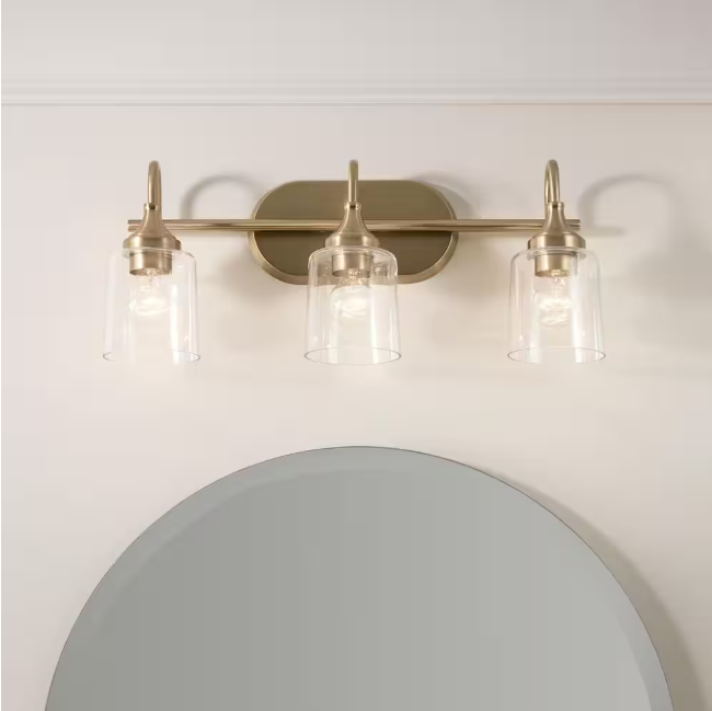 KICHLER Erta 24 in. 3-Light Champagne Bronze Bathroom Vanity Light with Clear Glass Shades