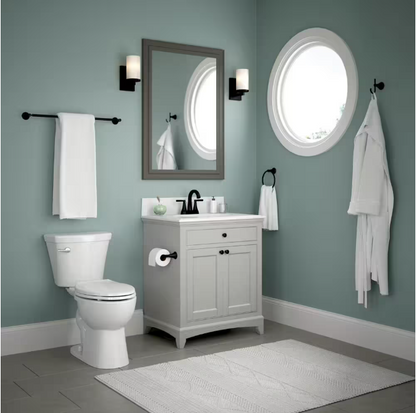 Delta Lorna Wall Mounted Pivot Arm Toilet Paper Holder Bath Hardware Accessory in Matte Black