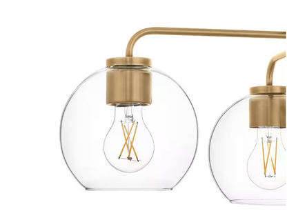 Hampton Bay Nelwyn 25 in. 4-Light Vintage Brass Chandelier with Clear Glass Globe Shades